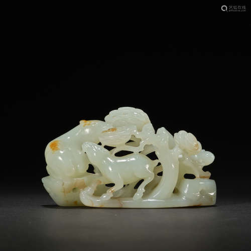 A white jade 'deers in the forest' carving,Liao dynasty