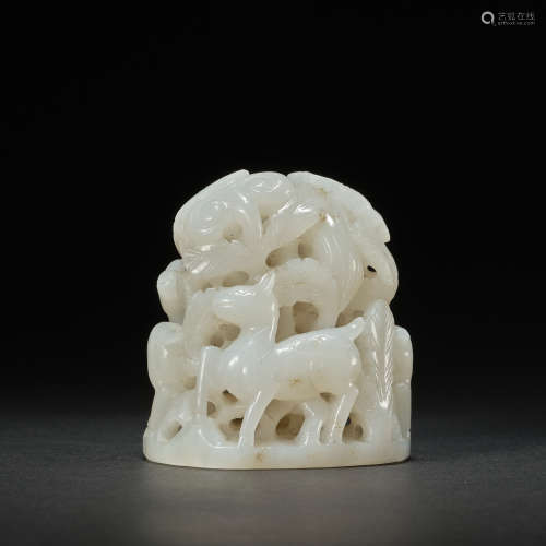 A white jade 'deers in the forest' carving,Liao dynasty