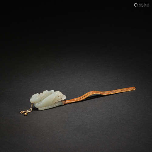 A white jade 'phoenix' and gilded silver hair pin,Qing dynas...
