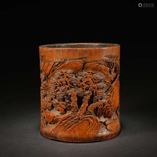 A carved bamboo 'hunting forest' brushpot , Qing dynasty