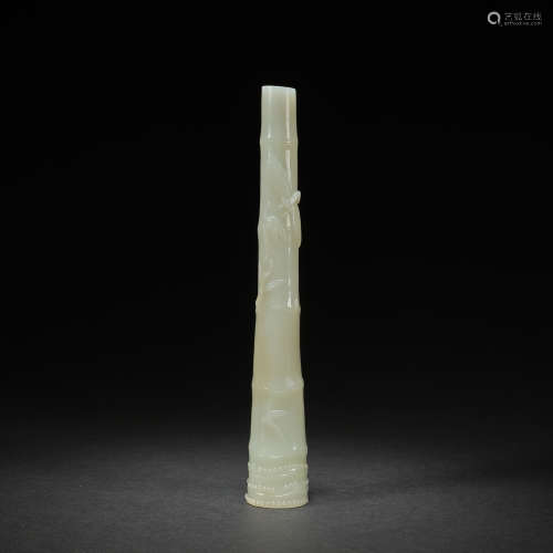 A rare white 'bamboo and dragonfly' group jade paperweight ,...