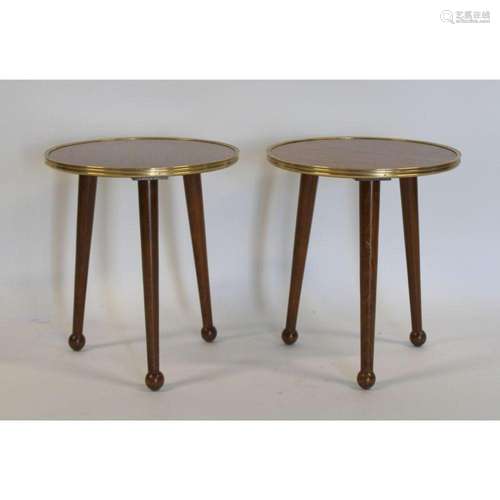 A Pair Of Side Tables With Brass Trim