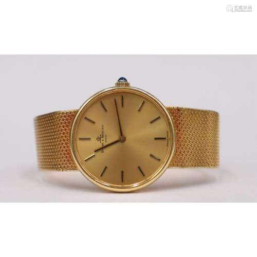 JEWELRY. Baume & Mercier 18kt Gold Bracelet Watch.