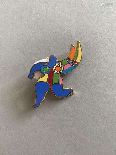 Niki de SAINT PHALLE,  "Nana "<br />
Broche penden...