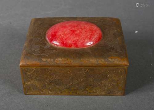 A gem-inlaid copper jewelry box