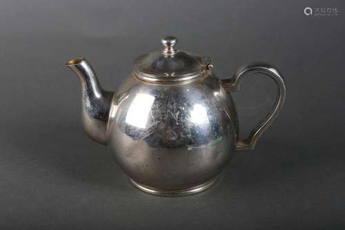 A silver coffee pot