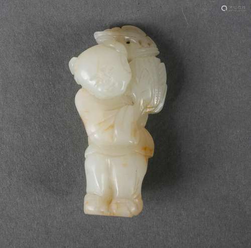 A white jade figurine