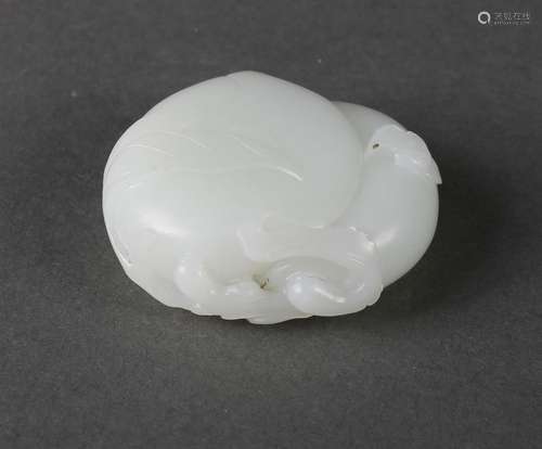 A white jade peach pendant