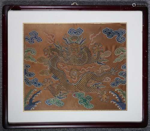 A dragon patterned mirror frame