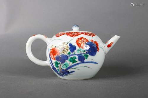 A multicolored porcelain teapot