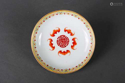 A red ground famille rose flower porcelain plate