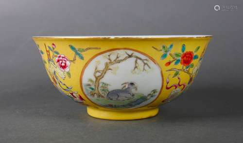 A yellow ground goat enamel porcelain bowl