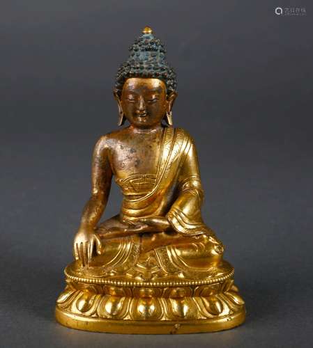 A gilding copper Sakyamuni statue