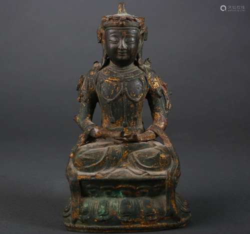 A copper Amitabha buddha statue