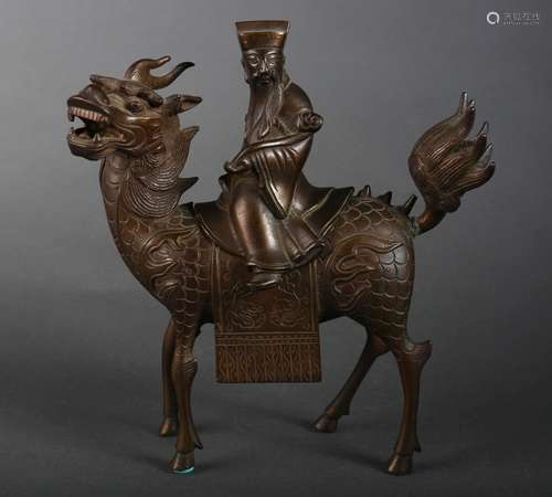 A copper qilin ornament