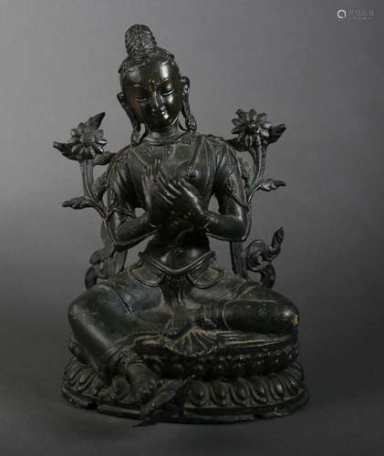 A copper green tara statue