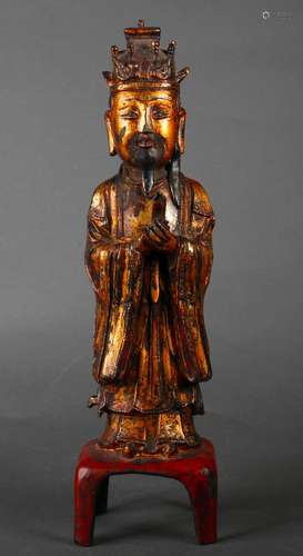 A gilt copper figure statue