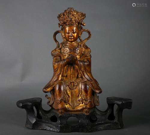 A gilt copper figure statue