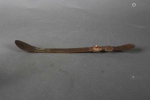 An exquisite copper spoon