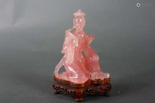 A pink crystal figurine