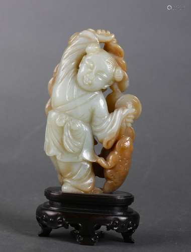 A white jade figure ornament