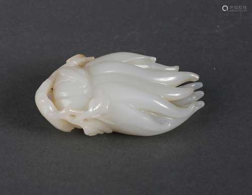 A white jade buddha hand ornament