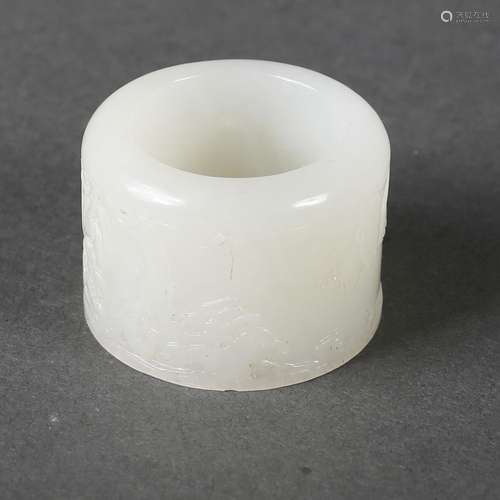 A white jade thumb ring