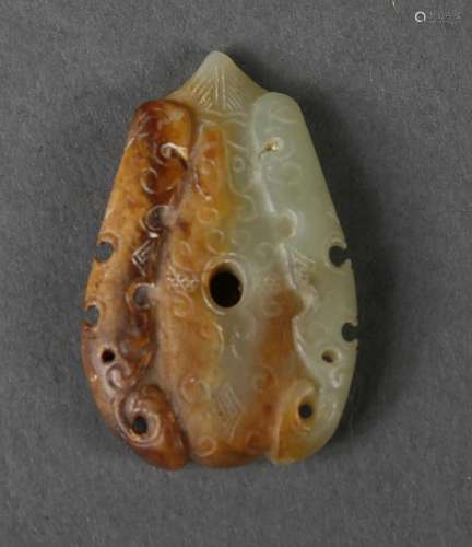 A yellow jade pendant