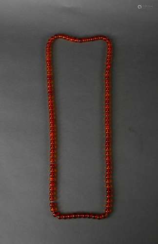 A string of amber court beads