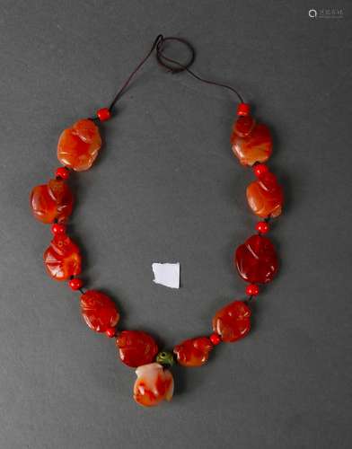 An agate monkey necklace