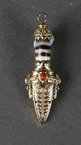 A dzi bead-inlaid pendant