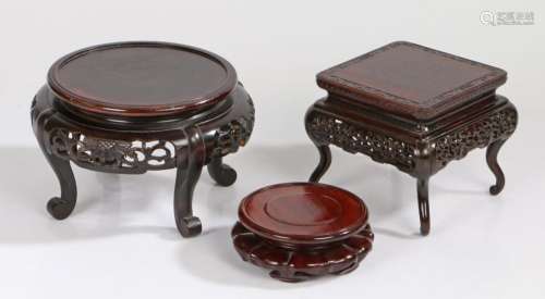 Three Chinese stands, the first example with a square top wi...