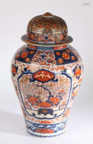 A large Japanese Imari vase and cover, the domed cover (AF) ...