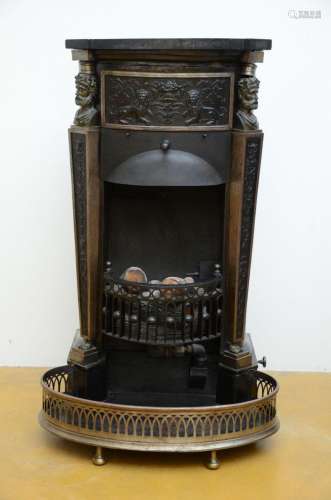 Empire stove in fonte with bronze figures and a marble top (...