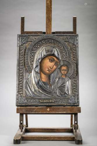 Russian icon 'Mother and Child' with a gilt silver r...