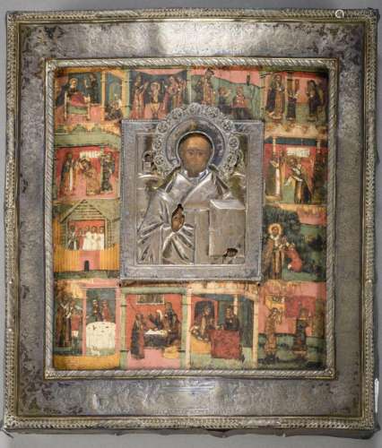 A Russian icon 'st. Nicholas' with silver riza (31x2...