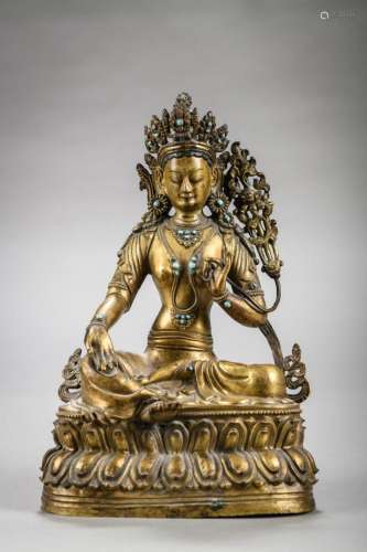 A Tibetan sculpture in copper repoussé 'green Tara',...