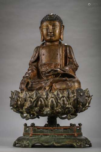 A large laquered bronze sculpture Buddha Shakyamuni on lotus...