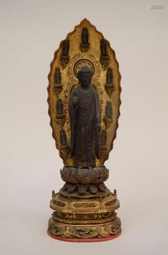 A finely carved sculpture in lacquered wood 'Buddha Mait...