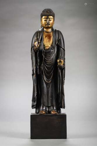 Japanese lacquered wooden statue of a standing Buddha, Edo p...