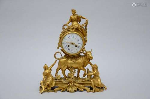 A gilt bronze clock with bull, 19th century (46x37x21cm)