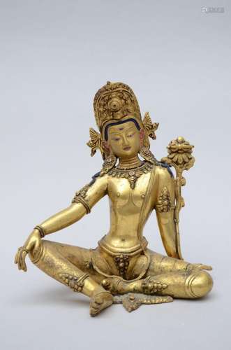 A seated Indra in gilt bronze (28x27x16cm)