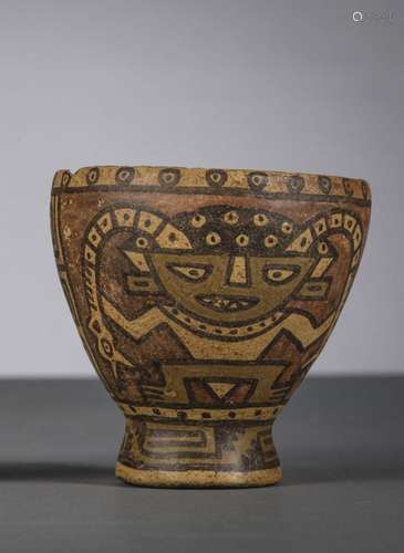 A pre-Columbian coupe 'character with snakes' (h11.5...