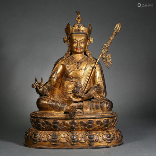 A Tibetan Gilt Bronze Figure Of Padmasambhava