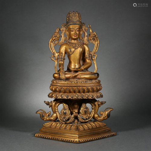A Tibetan Gilt Bronze Figure Of Crowned Buddha