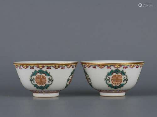 A pair of pastel cups