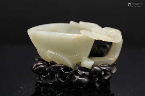 A CELADON JADE 'PEACH' CUP, Qing Dynasty (Sotheby&...