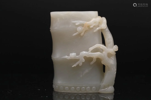 A PALE GREEN JADE BAMBOO-FORM VASE, Qing Dynasty (Bonhams Lo...