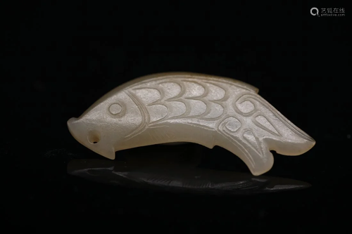 A WHITE JADE PENDANT 'FISH', probably Western Zhou...