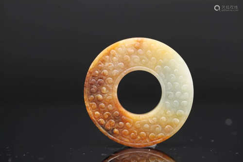 A WHITE AND RUSSET JADE BI DISC, Probably Han Dynasty (priva...